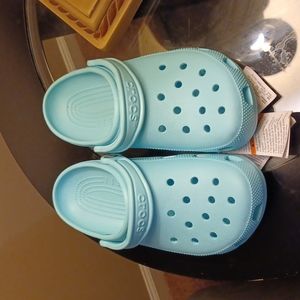 Light blue Crocs, brand new
